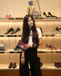 Juwei Teoh carrying Ferragamo Zig Zag Aileen Shoulder Bag