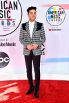 Rami-Malek-2018-America-Music-Awards-Red-Carpet-Fashion-Givenchy-Tom-Lorenzo-Site-2